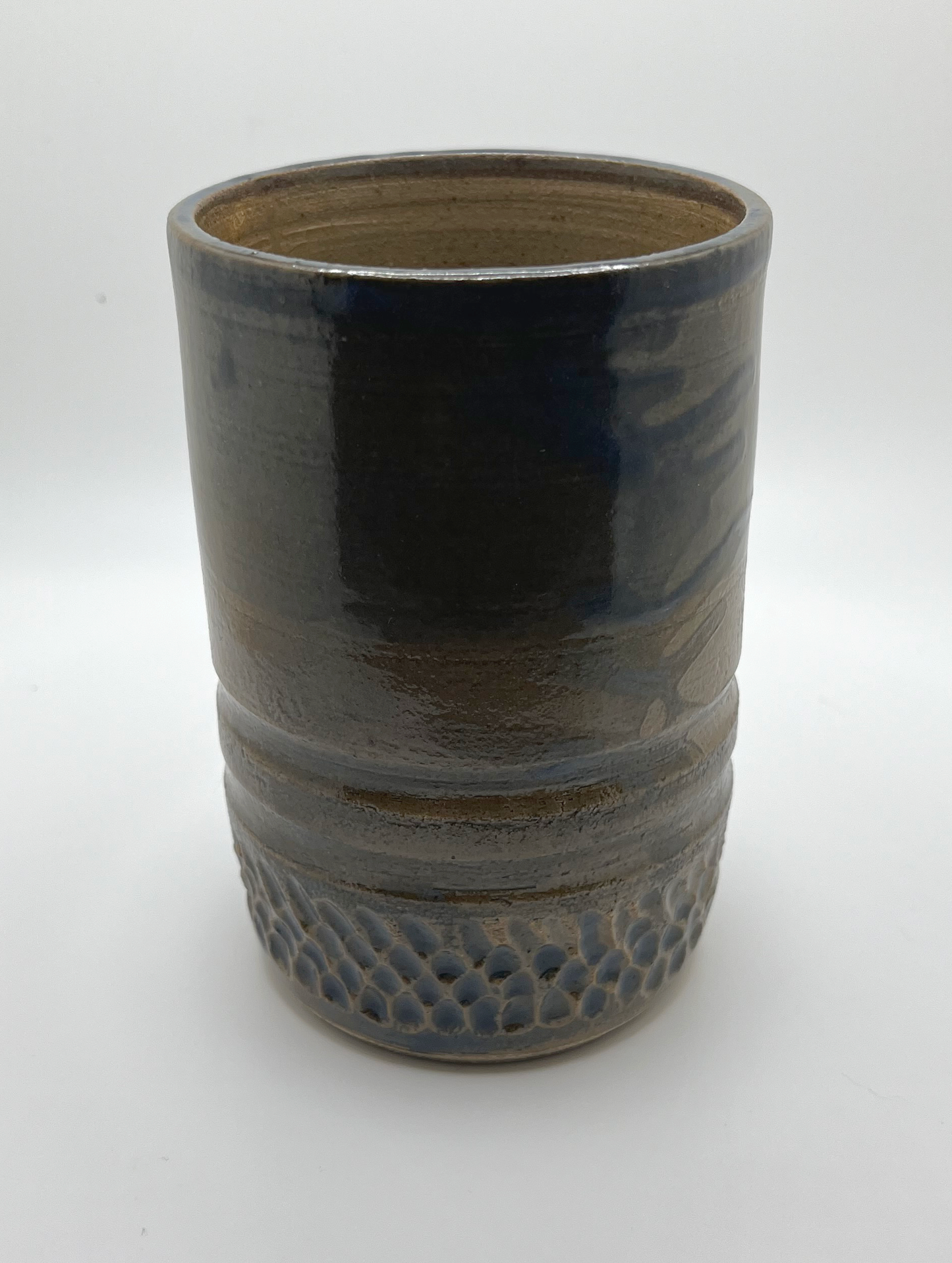 Carved utensil holder