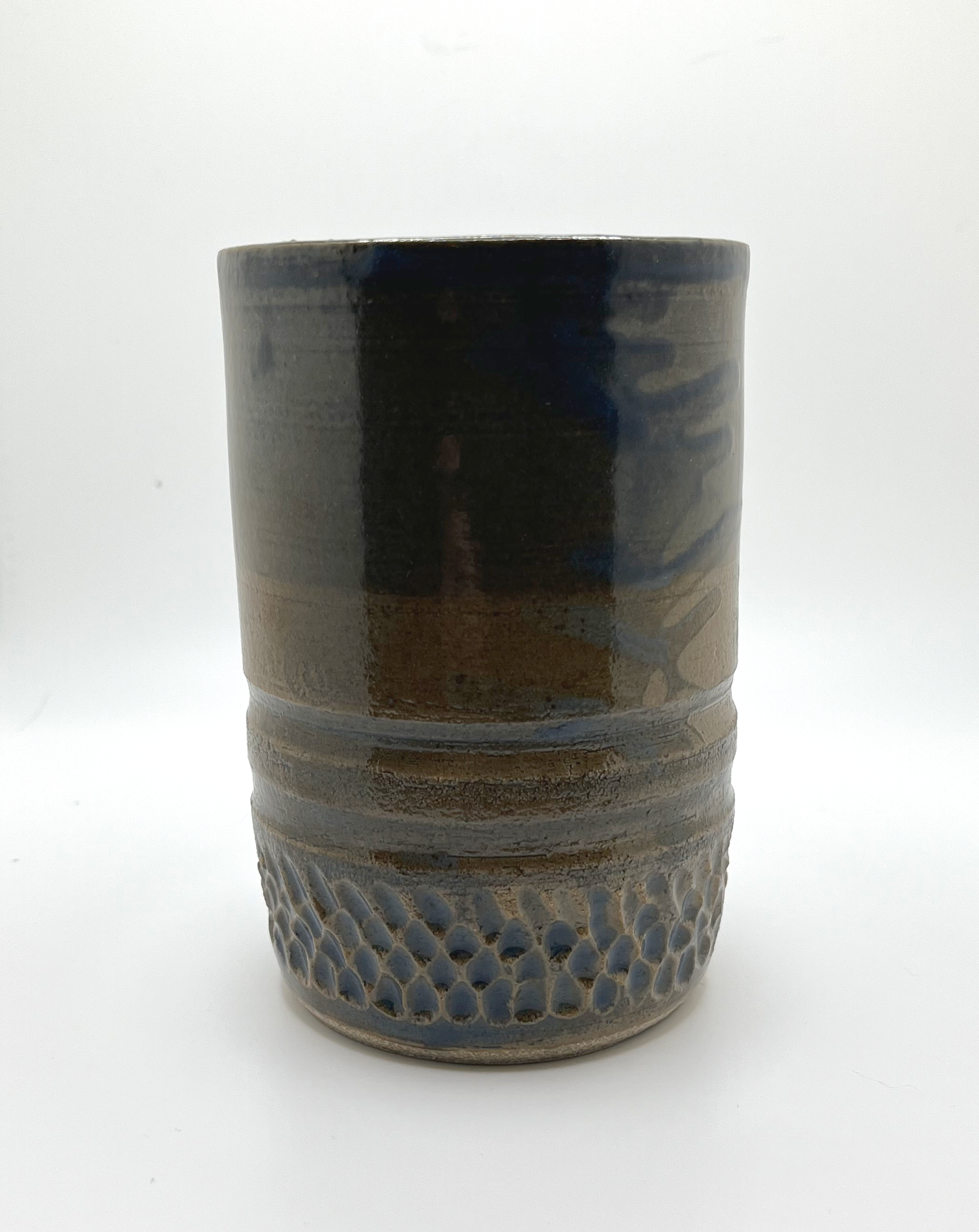 Carved utensil holder